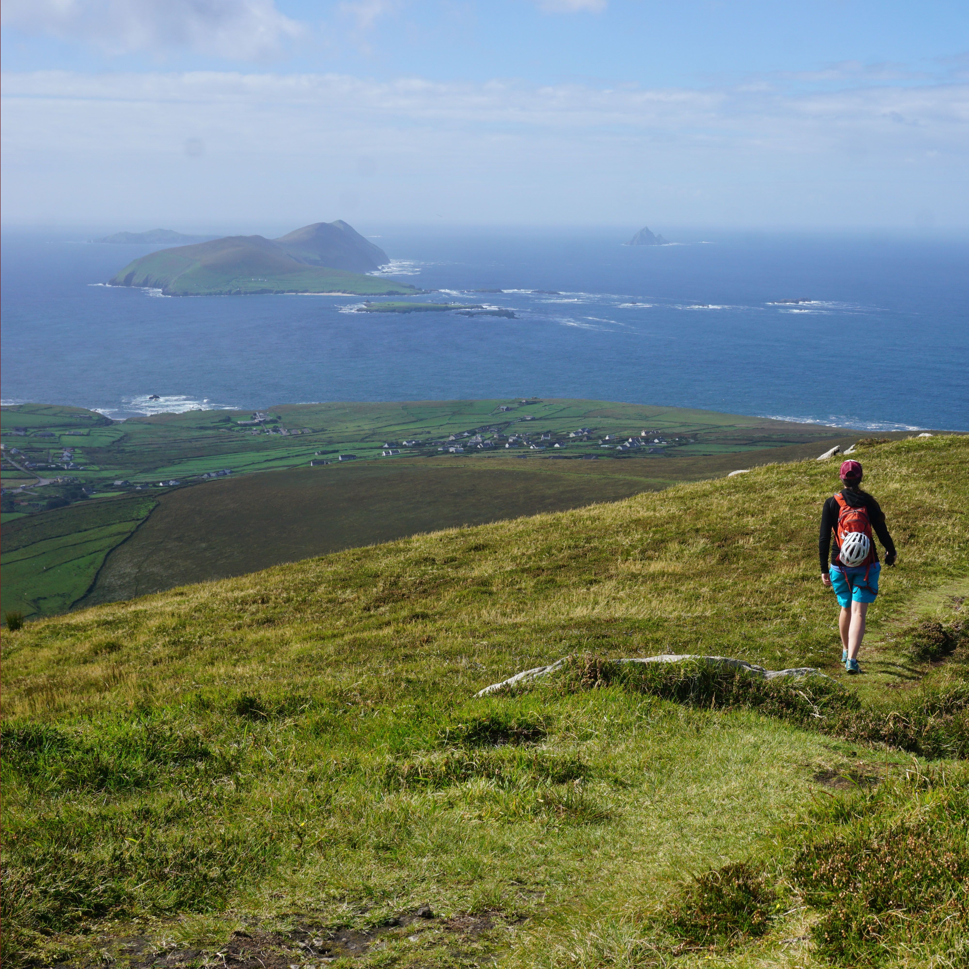 walking on high ground above Dunquin with Blasket islands in the background, Dingle Peninsula, Ireland