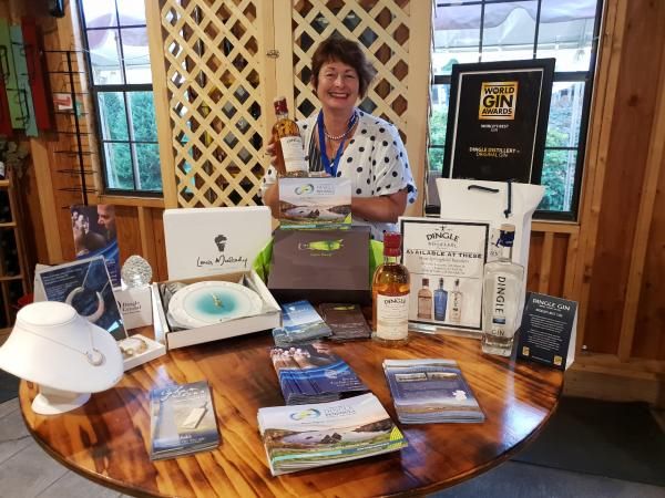 Photo of Mary Ferriter with Dingle Peninsula products at the Big E