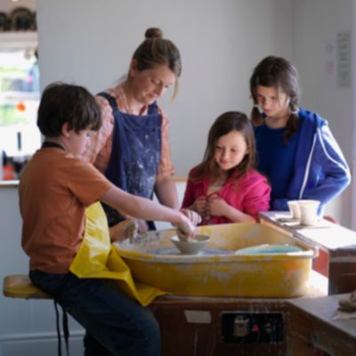 children learning pottery in Louis Mulcahy workshop Dingle Peninsula 