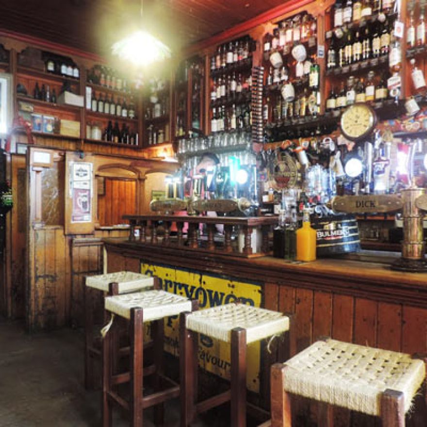 warm wood coloured interior of a traditional style bar dingle peninsula ireland