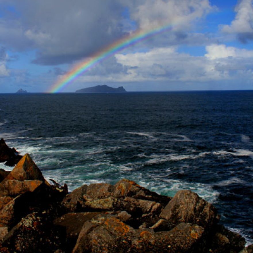 rainbow over the blasket islands with rocks in foreground dingle peninsula ireland